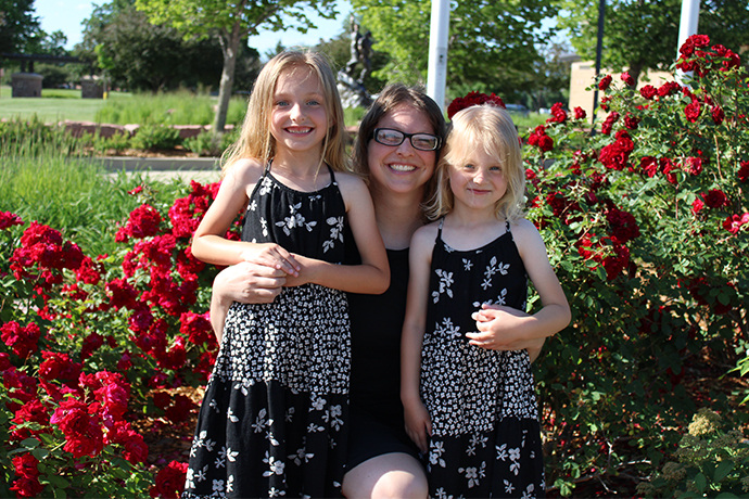 Future homebuyer Dalonda hugs her two smiling daughters.