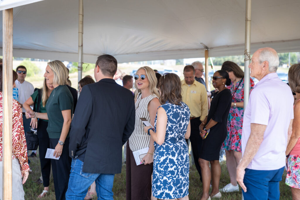 Habitat team member and supporters gather and mingle at the Cliffview Heights groundbreaking.