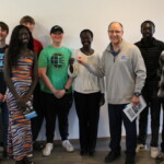 CTE Academy students and staff present the keys to Rebecca and her family. CTE students and teachers present the keys to Rebecca and her family.