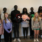 Project Warm-Up presented blankets to Rebecca and her children.