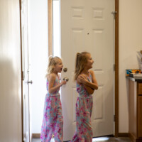Dalonda's daughters walk into the home with looks of excitement and surprise.