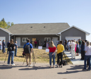 The crowd of Habitat supporters at Vickie and Dalonda's dedication, the 200th Home Dedication Celebration.