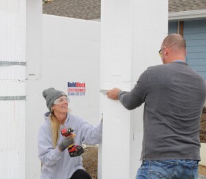 Volunteers add bracing to ICF walls in Millard Acres.