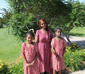 Family photo of Mekdes and her two daughters