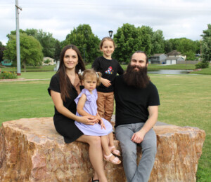 Family photo of future Millard Acres homebuyers Yana and Vitaliy and their two children