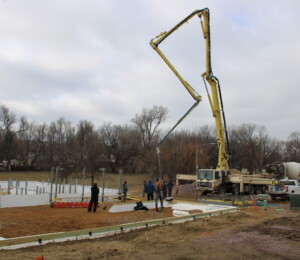 Habitat's Master's Builders and construction team prepare for the concrete to be poured into the ICF foundation of a twin home.